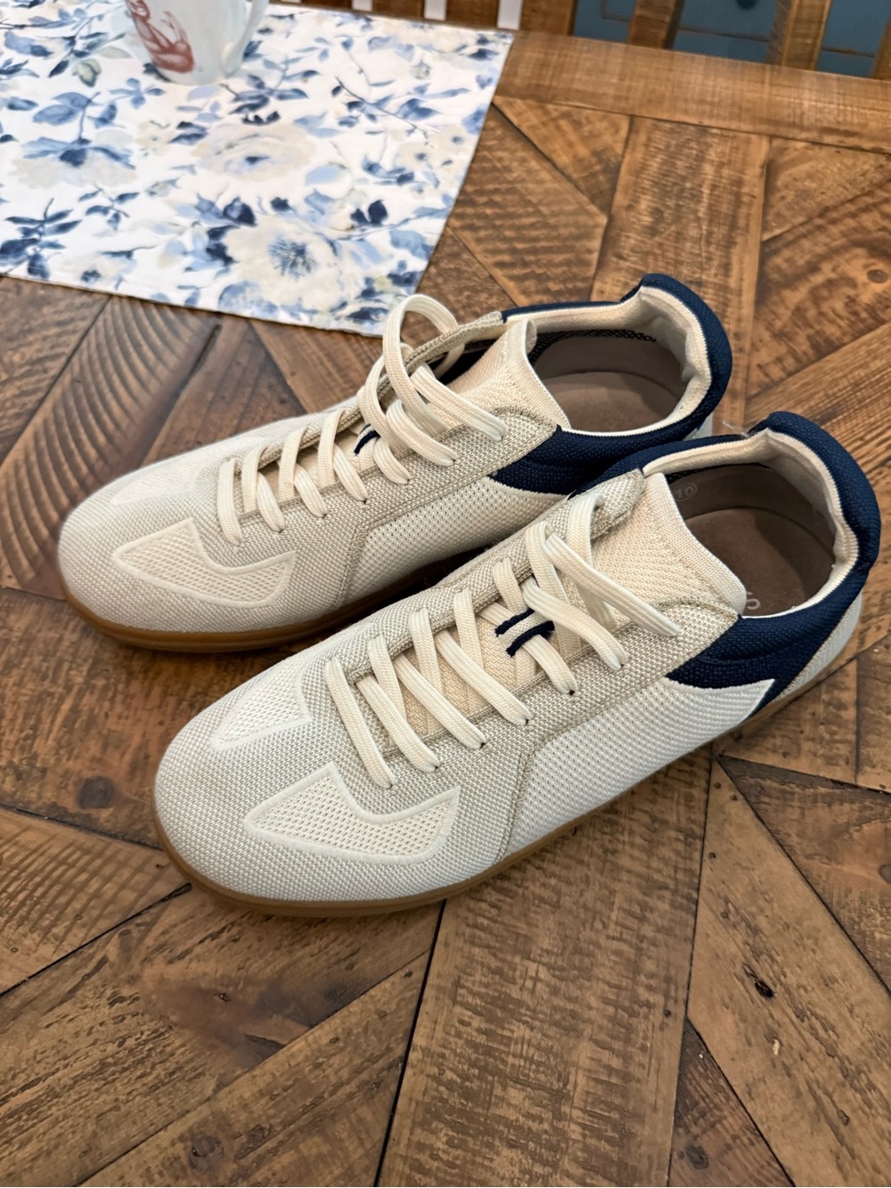 Rothy's Men's Knit Sneakers in Cream with Navy Collar